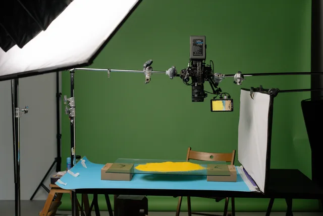 A detailed view of a professional photography studio setup, capturing products with precise lighting. Product photography in England: UKCA and CE rules for the shoot brief